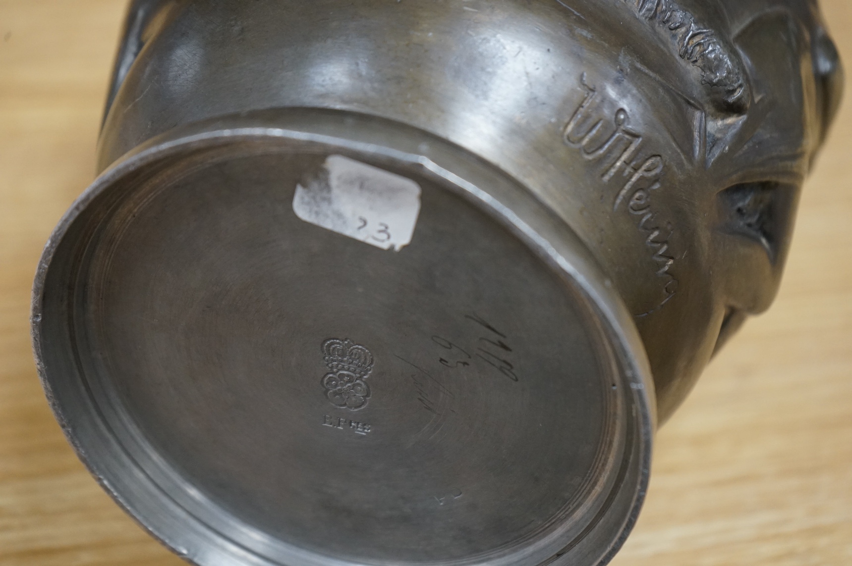 An Art Nouveau large pewter ewer, singed W. Herring, 47cm tall. Condition - poor